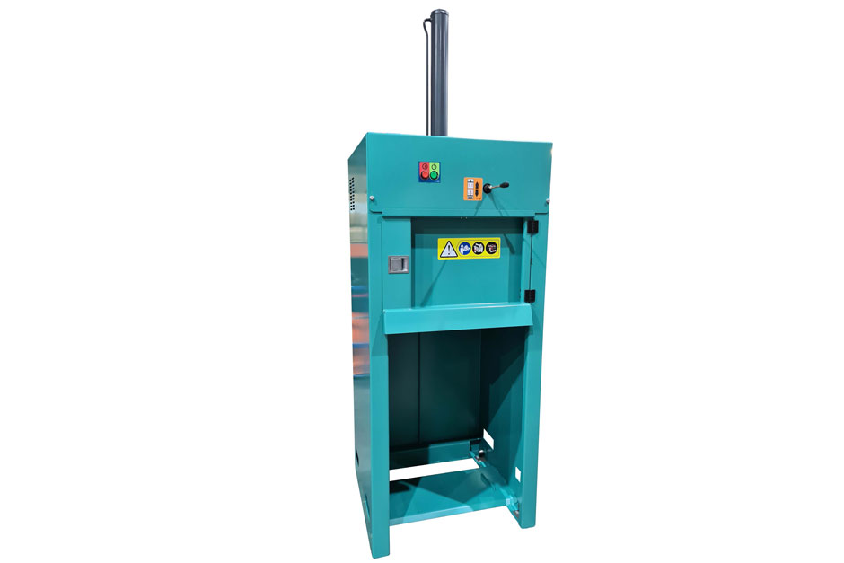 a 240 LTR bin press compactor in green