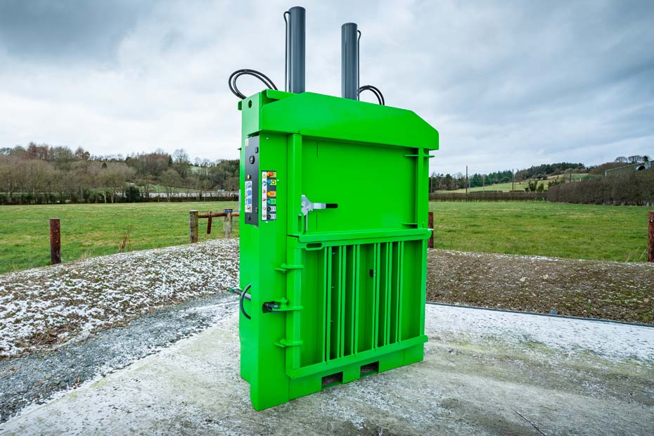 a Green coloured 450 waste baler